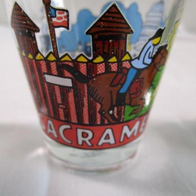 7 shot glasses, various sizes