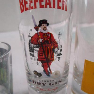 7 shot glasses, various sizes