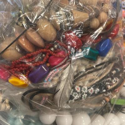 Large bag of wood bead, shell and more necklaces