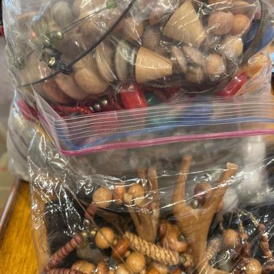 Large bag of wood bead, shell and more necklaces