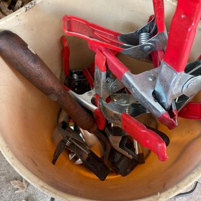 Bucket of clamps