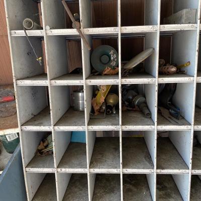 Metal slotted wall hanger