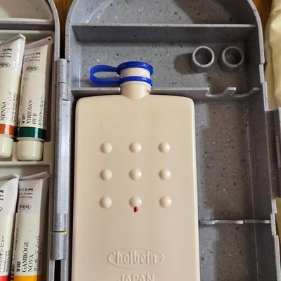 Holding Travel Palette & Watercolors, Pad, and French Paint Brushes
