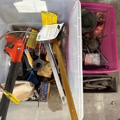 Assortment of tools and hardware