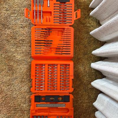 Orange plastic case of bits and drill bits