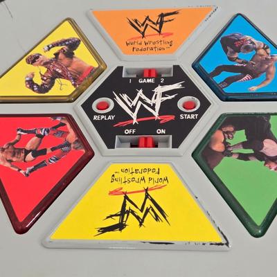 LOT 19B: Let's Get Ready to Rumble.... WWF On the Ropes Electronic Talking Game, Yo-Yos, & 2 Small Figures