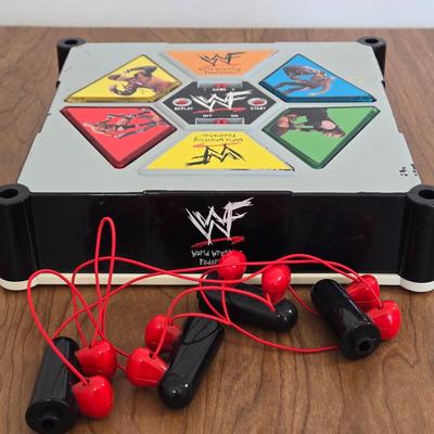 LOT 19B: Let's Get Ready to Rumble.... WWF On the Ropes Electronic Talking Game, Yo-Yos, & 2 Small Figures