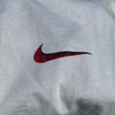 LOT 50A: Vintage 90s/Y2K Nike T Shirts & Jackets