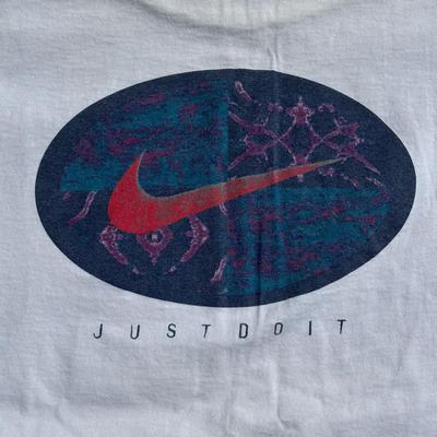 LOT 50A: Vintage 90s/Y2K Nike T Shirts & Jackets
