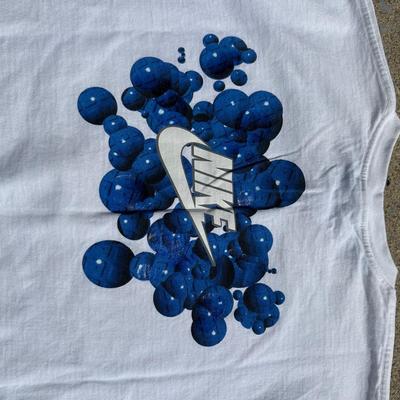 LOT 50A: Vintage 90s/Y2K Nike T Shirts & Jackets