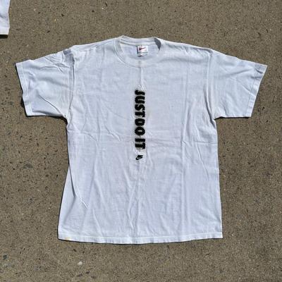 LOT 50A: Vintage 90s/Y2K Nike T Shirts & Jackets