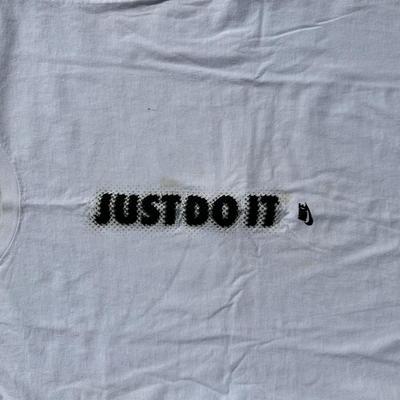 LOT 50A: Vintage 90s/Y2K Nike T Shirts & Jackets