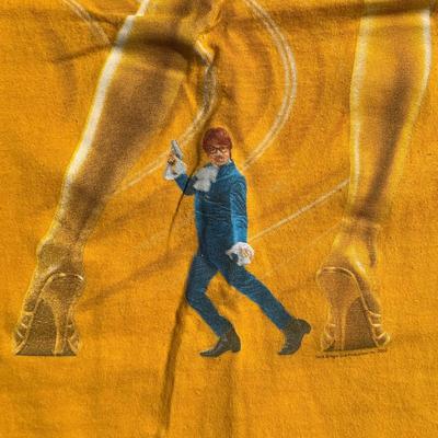 LOT 54A: Two Vintage Austin Powers Movie Promo T Shirts & Mini Me Figure
