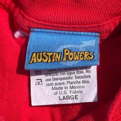 LOT 54A: Two Vintage Austin Powers Movie Promo T Shirts & Mini Me Figure