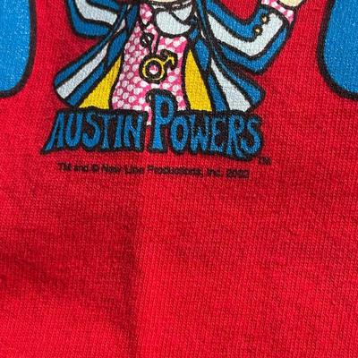 LOT 54A: Two Vintage Austin Powers Movie Promo T Shirts & Mini Me Figure
