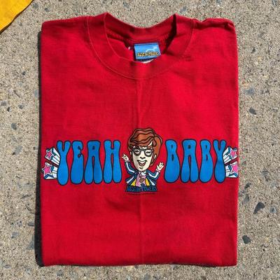 LOT 54A: Two Vintage Austin Powers Movie Promo T Shirts & Mini Me Figure