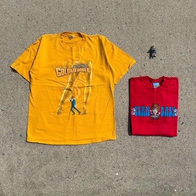 LOT 54A: Two Vintage Austin Powers Movie Promo T Shirts & Mini Me Figure