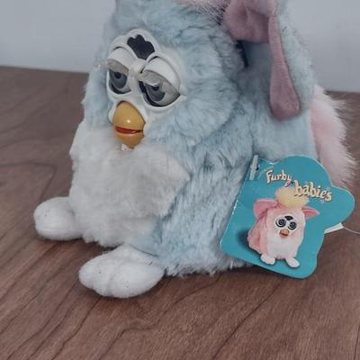 LOT 81B: Furby Baby and (3) Sad Sam Honey Dolls (Tropical Honey, Tropical Sad Sam, and Mini Sad Sam