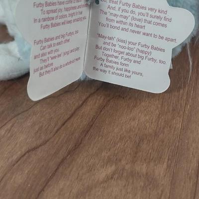 LOT 81B: Furby Baby and (3) Sad Sam Honey Dolls (Tropical Honey, Tropical Sad Sam, and Mini Sad Sam