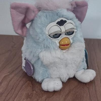 LOT 81B: Furby Baby and (3) Sad Sam Honey Dolls (Tropical Honey, Tropical Sad Sam, and Mini Sad Sam