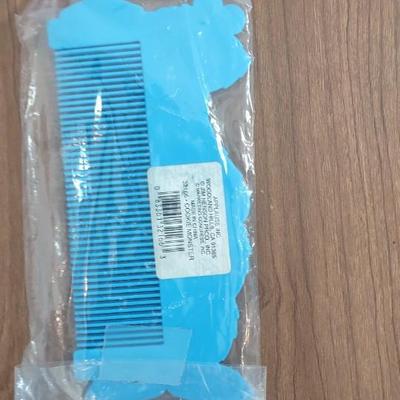 LOT 92B: Cookie Monster Comb, (4) Toys R Us Exclusive Elmo Plush Dolls and Sleepy Ernie Doll