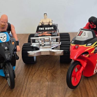 LOT 97B: The Rock Truck & Steve Austin, & Kane Motorcycle Toys