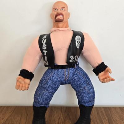 LOT 99B: WWF Undertaker, Steve Austin, & The Rock Wresting Dolls