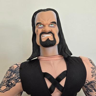 LOT 99B: WWF Undertaker, Steve Austin, & The Rock Wresting Dolls