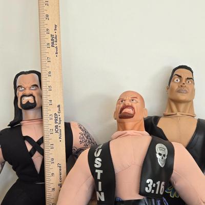 LOT 99B: WWF Undertaker, Steve Austin, & The Rock Wresting Dolls