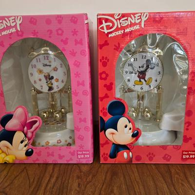 LOT 100A: NIB Disney Minnie and Mickey Anniversary Clocks