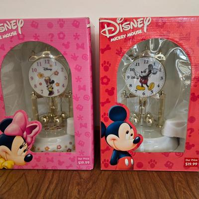 LOT 100A: NIB Disney Minnie and Mickey Anniversary Clocks