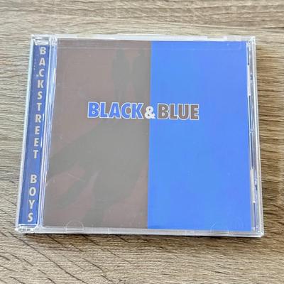 LOT 104A: Y2K Backstreet Boys Black & Blue CD & Tour T-Shirt
