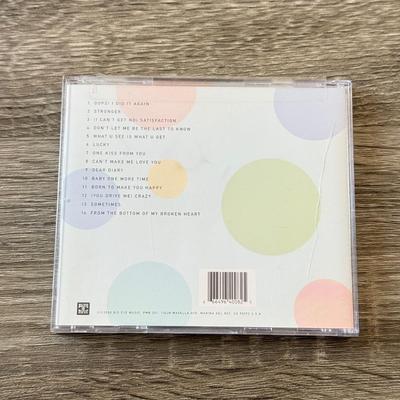 LOT 105A: Y2K Britney Spears Planet Hollywood Ladies' Shirt (Large) & Collection of CDs: Britney Spears' Boys, Don't...