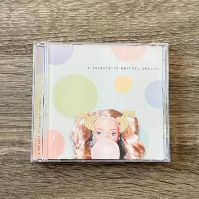 LOT 105A: Y2K Britney Spears Planet Hollywood Ladies' Shirt (Large) & Collection of CDs: Britney Spears' Boys, Don't...