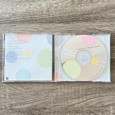 LOT 105A: Y2K Britney Spears Planet Hollywood Ladies' Shirt (Large) & Collection of CDs: Britney Spears' Boys, Don't...