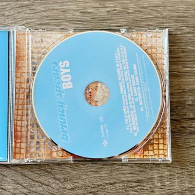 LOT 105A: Y2K Britney Spears Planet Hollywood Ladies' Shirt (Large) & Collection of CDs: Britney Spears' Boys, Don't...