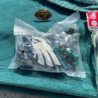 LOT 125L: Philadelphia Eagles Pajamas, Sweat Pants, Hats & More