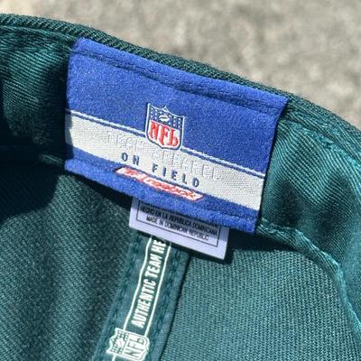 LOT 125L: Philadelphia Eagles Pajamas, Sweat Pants, Hats & More
