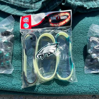LOT 125L: Philadelphia Eagles Pajamas, Sweat Pants, Hats & More