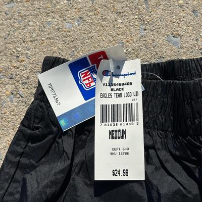 LOT 125L: Philadelphia Eagles Pajamas, Sweat Pants, Hats & More