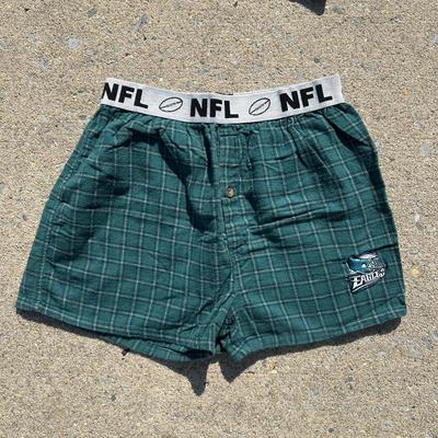 LOT 125L: Philadelphia Eagles Pajamas, Sweat Pants, Hats & More