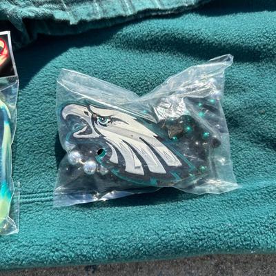 LOT 125L: Philadelphia Eagles Pajamas, Sweat Pants, Hats & More