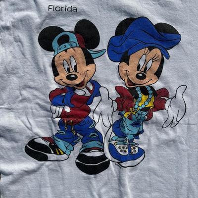 LOT 126L: Vintage Disney T Shirt Collection & More!
