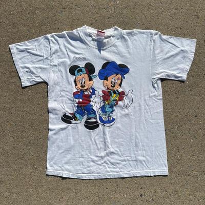 LOT 126L: Vintage Disney T Shirt Collection & More!