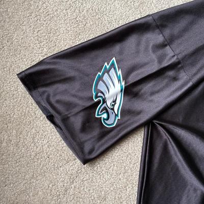LOT 130A: 2000s NFL Players Inc Donovan McNabb Black Eagles Jersey (XL)