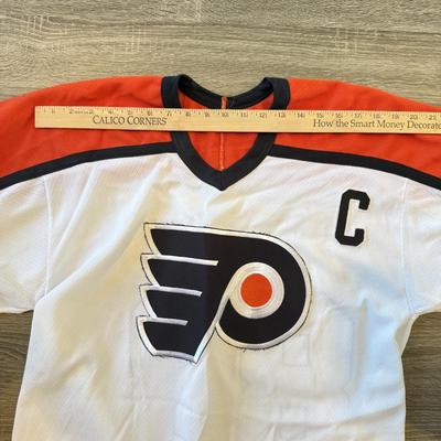 LOT 145A: 2000s NHL Philadelphia Flyers #88 Eric Lindros CCM Hockey Jersey w/ UnIDed Signatures
