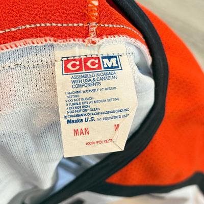 LOT 145A: 2000s NHL Philadelphia Flyers #88 Eric Lindros CCM Hockey Jersey w/ UnIDed Signatures