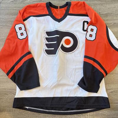 LOT 145A: 2000s NHL Philadelphia Flyers #88 Eric Lindros CCM Hockey Jersey w/ UnIDed Signatures