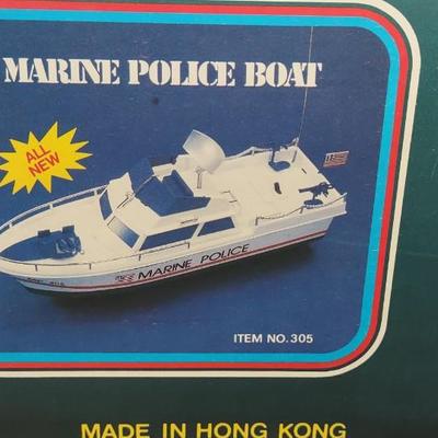 LOT 171B: NIP Radio Controlled Model Boats: Nikko America Inc Challenger V & Marine Police