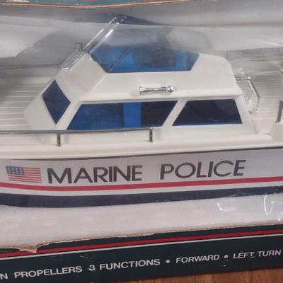 LOT 171B: NIP Radio Controlled Model Boats: Nikko America Inc Challenger V & Marine Police